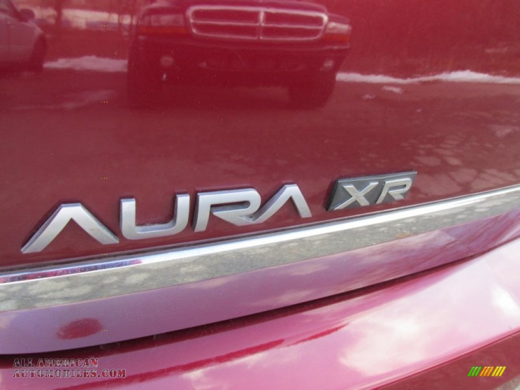 2009 Aura XR - Red Jewel Tintcoat / Black photo #16