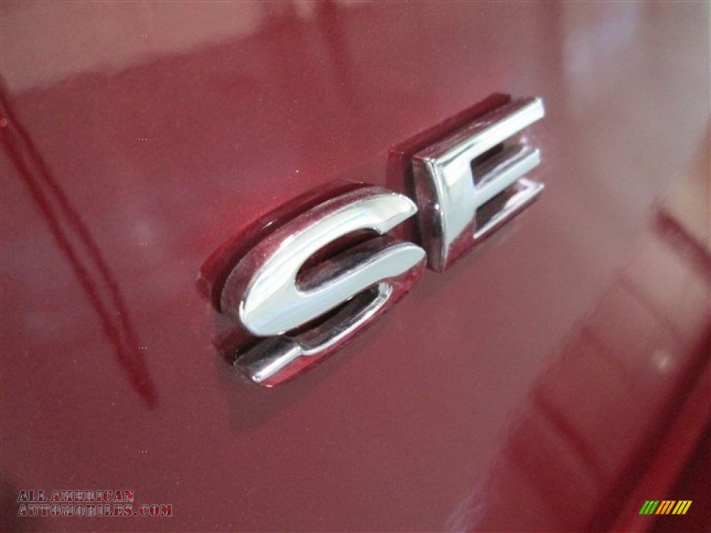 2015 Fiesta SE Sedan - Ruby Red Metallic / Charcoal Black photo #7