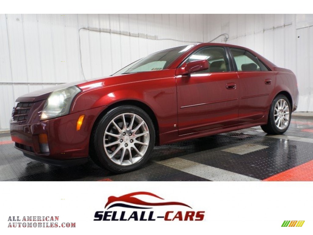Infrared / Cashmere Cadillac CTS Sport Sedan