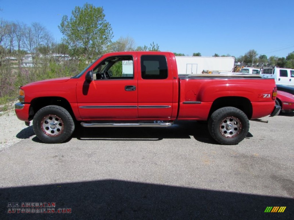 2005 Sierra 1500 SLE Extended Cab 4x4 - Fire Red / Neutral photo #1