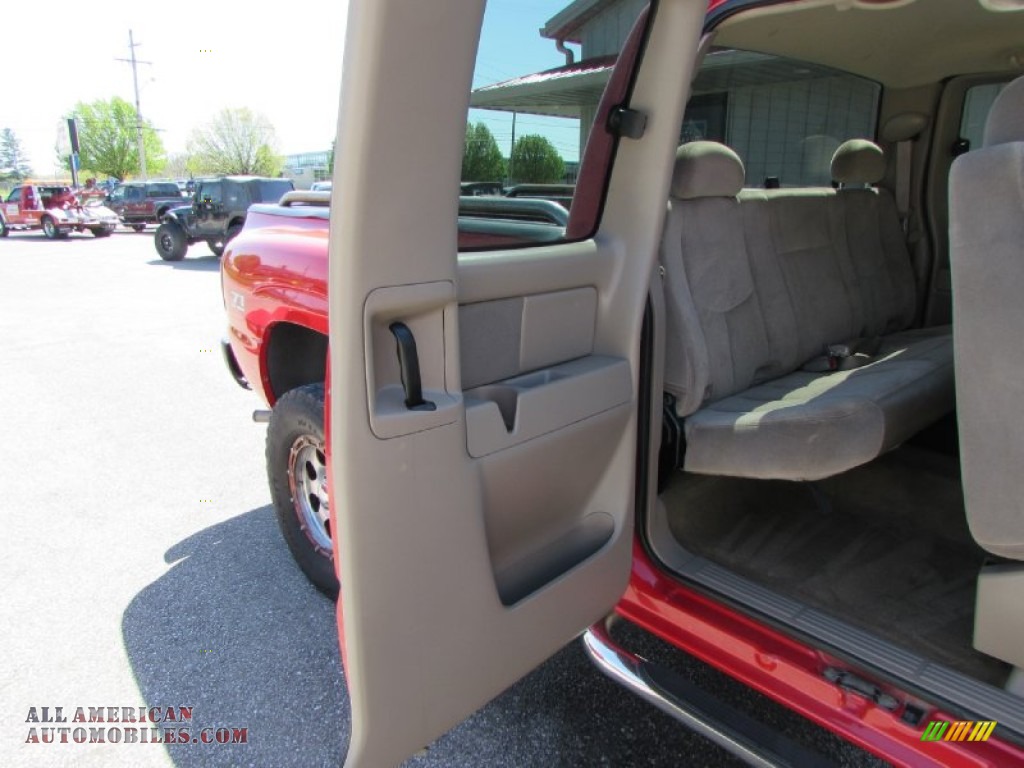 2005 Sierra 1500 SLE Extended Cab 4x4 - Fire Red / Neutral photo #17