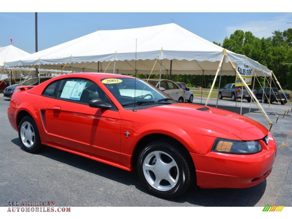 Laser Red Metallic / Dark Charcoal Ford Mustang V6 Coupe
