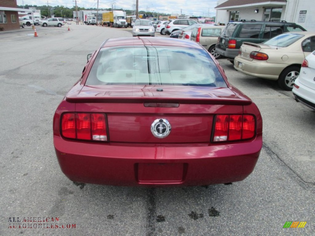 2007 Mustang V6 Premium Coupe - Redfire Metallic / Medium Parchment photo #10
