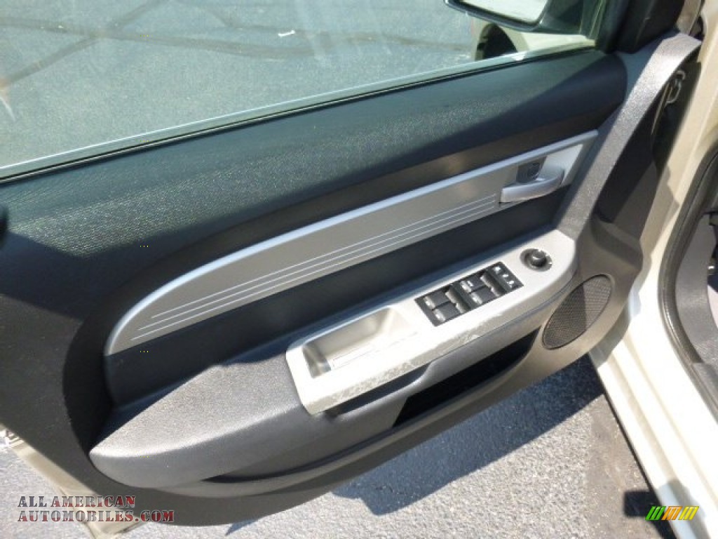 2009 Sebring LX Sedan - Light Sandstone Metallic / Dark Slate Gray photo #16