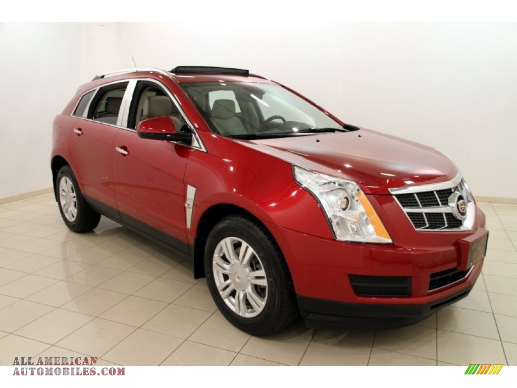 Crystal Red Tintcoat / Shale/Brownstone Cadillac SRX Luxury
