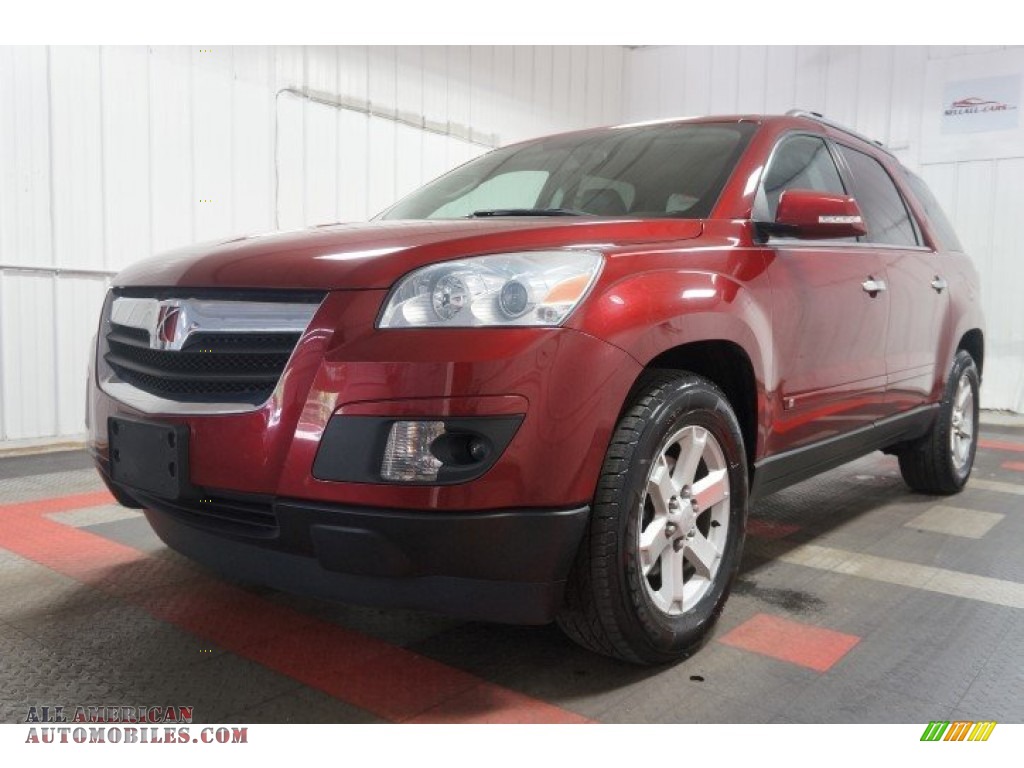 2009 Outlook XR AWD - Red Jewel Tintcoat / Black photo #3