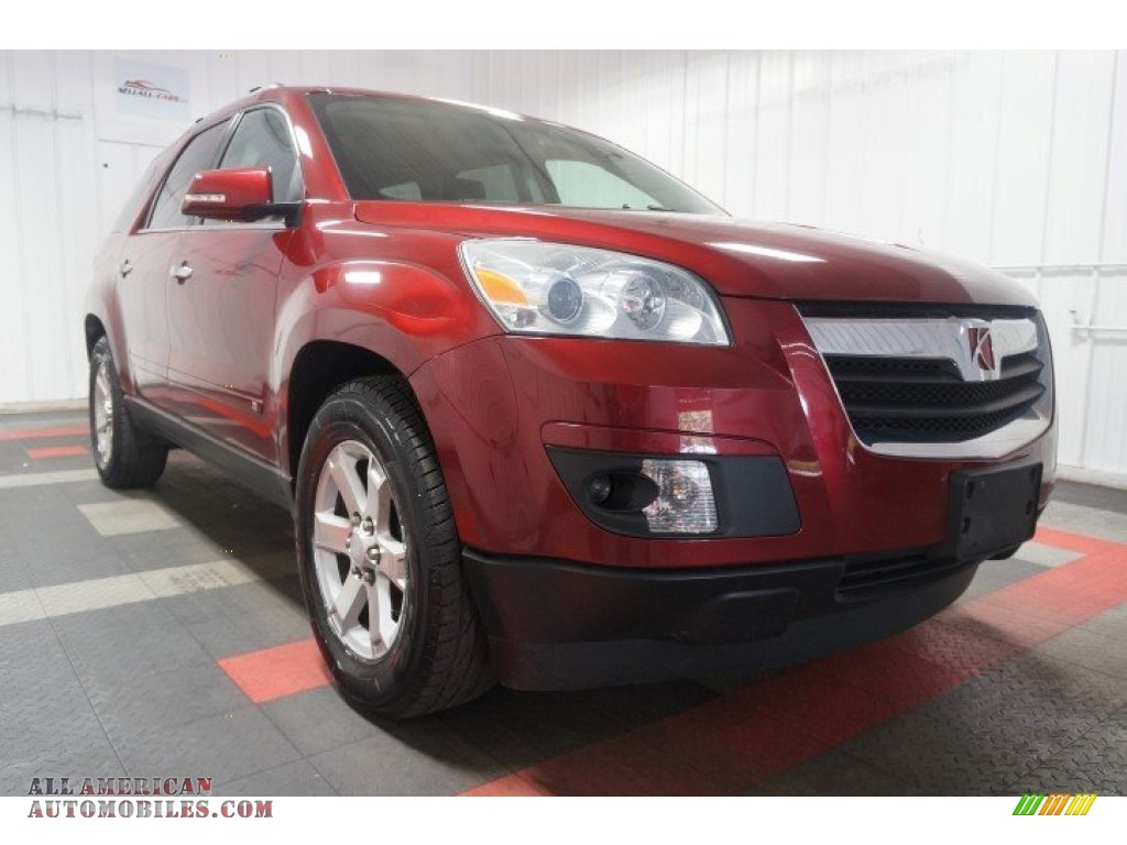 2009 Outlook XR AWD - Red Jewel Tintcoat / Black photo #5