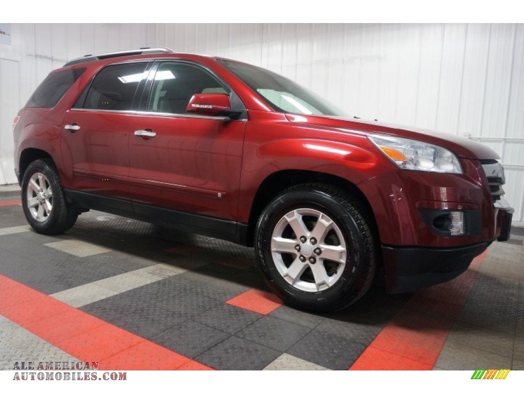 2009 Outlook XR AWD - Red Jewel Tintcoat / Black photo #6