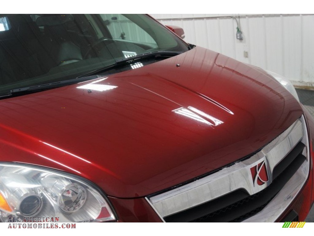 2009 Outlook XR AWD - Red Jewel Tintcoat / Black photo #38