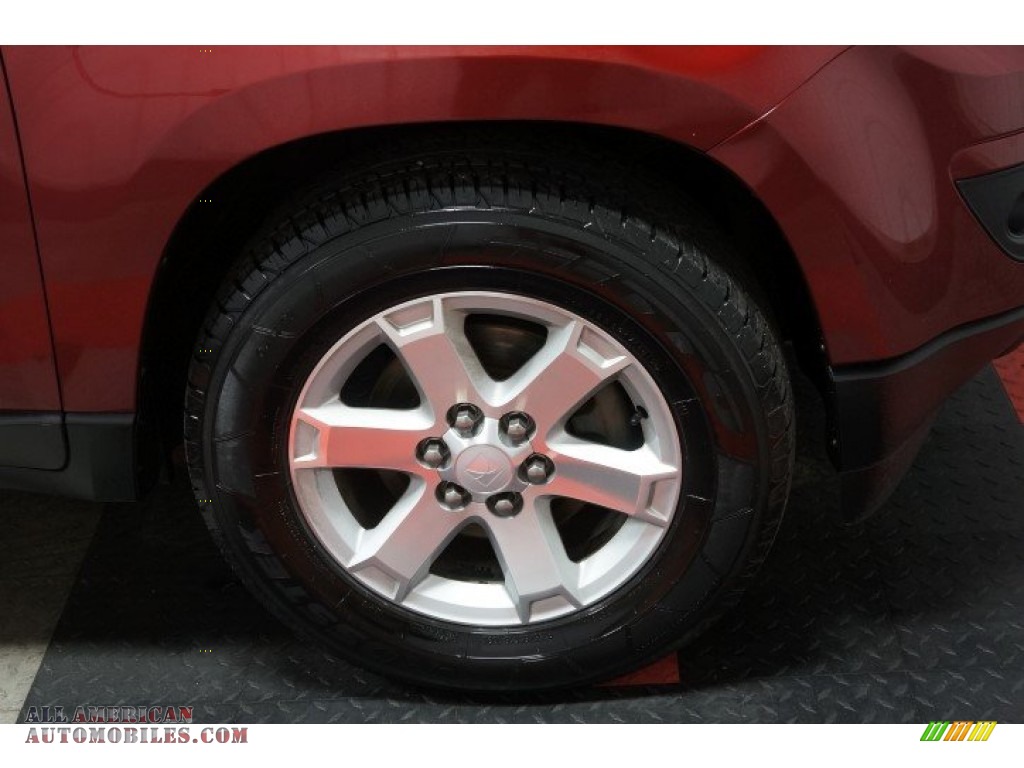 2009 Outlook XR AWD - Red Jewel Tintcoat / Black photo #40