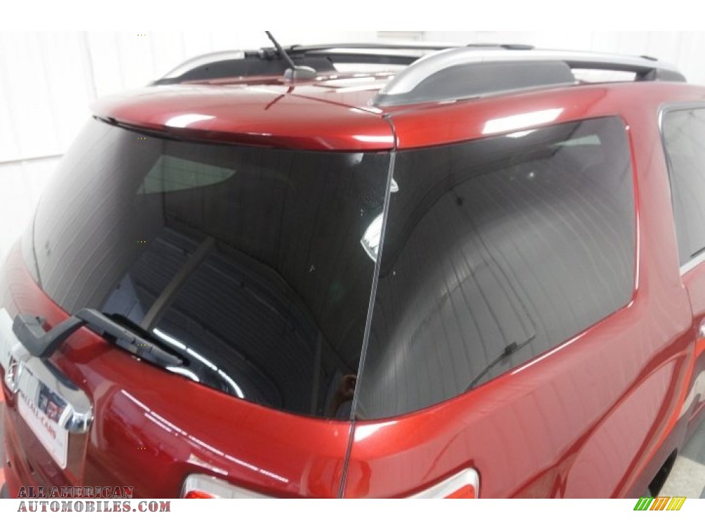 2009 Outlook XR AWD - Red Jewel Tintcoat / Black photo #69