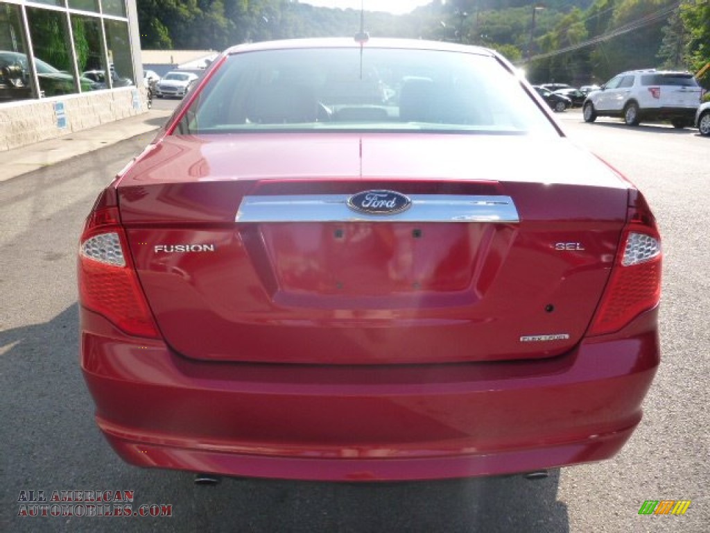 2012 Fusion SEL V6 - Red Candy Metallic / Camel photo #6