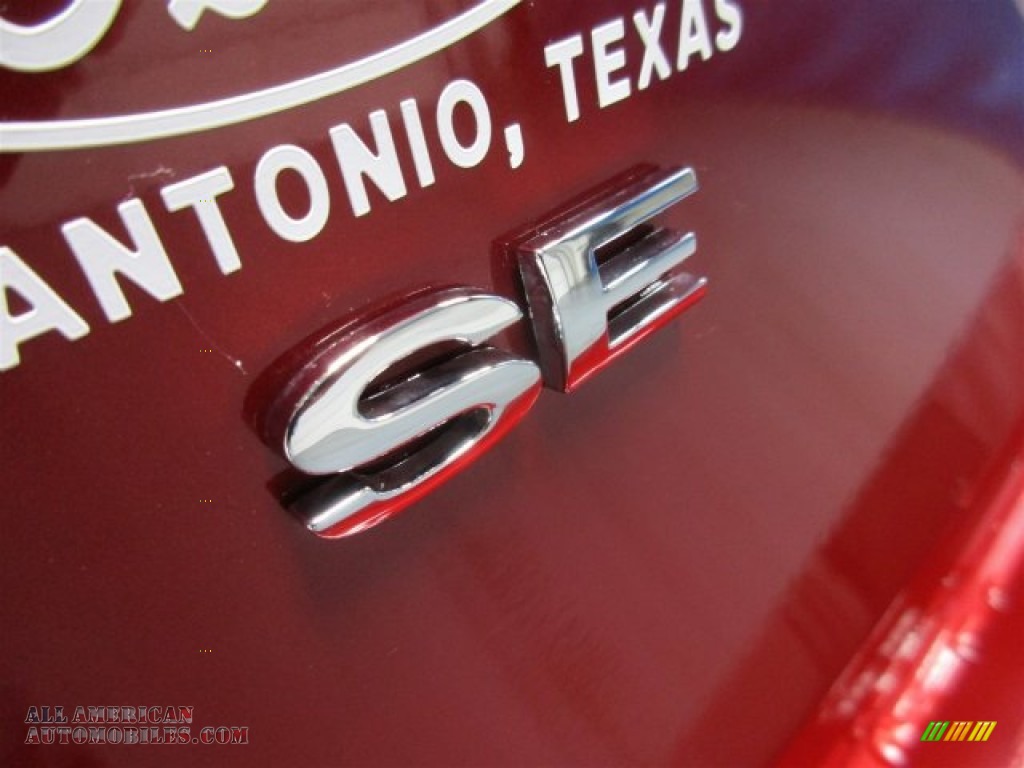2016 Fiesta SE Sedan - Ruby Red Metallic / Charcoal Black photo #6
