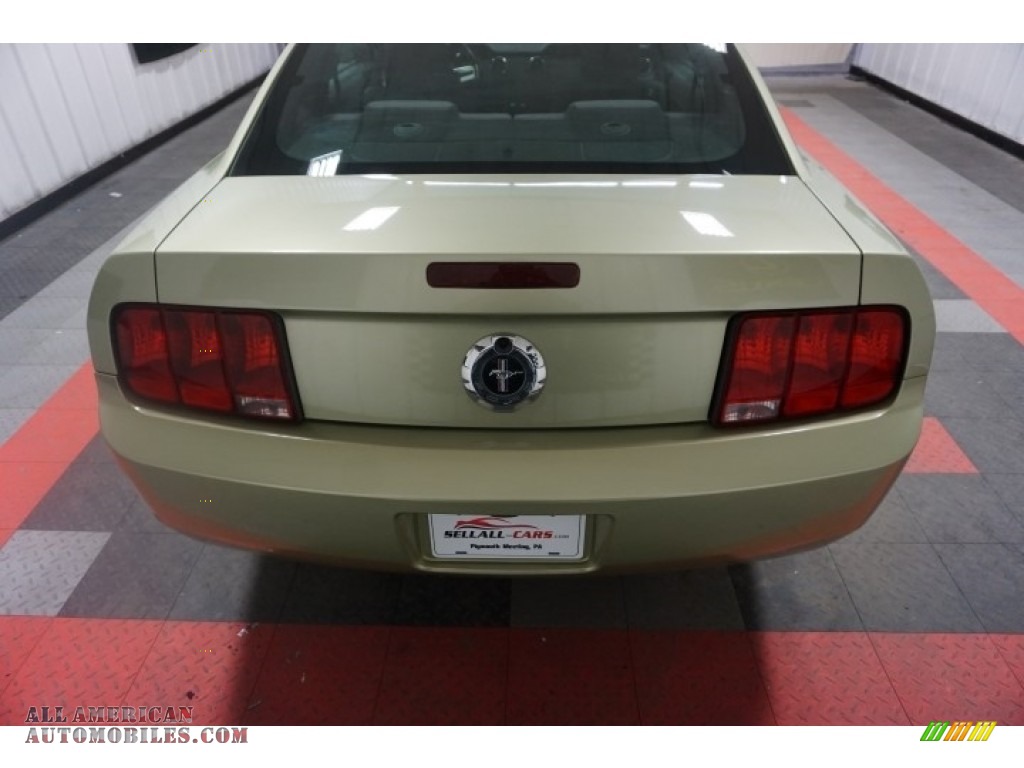 2006 Mustang V6 Premium Coupe - Legend Lime Metallic / Red/Dark Charcoal photo #9