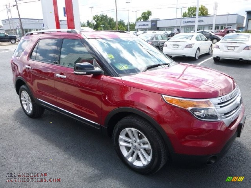 Ruby Red / Charcoal Black Ford Explorer XLT 4WD