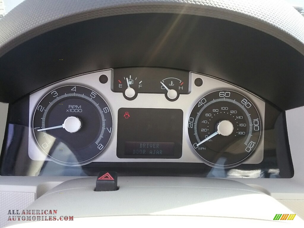 2010 Mariner V6 4WD - White Suede / Black photo #13