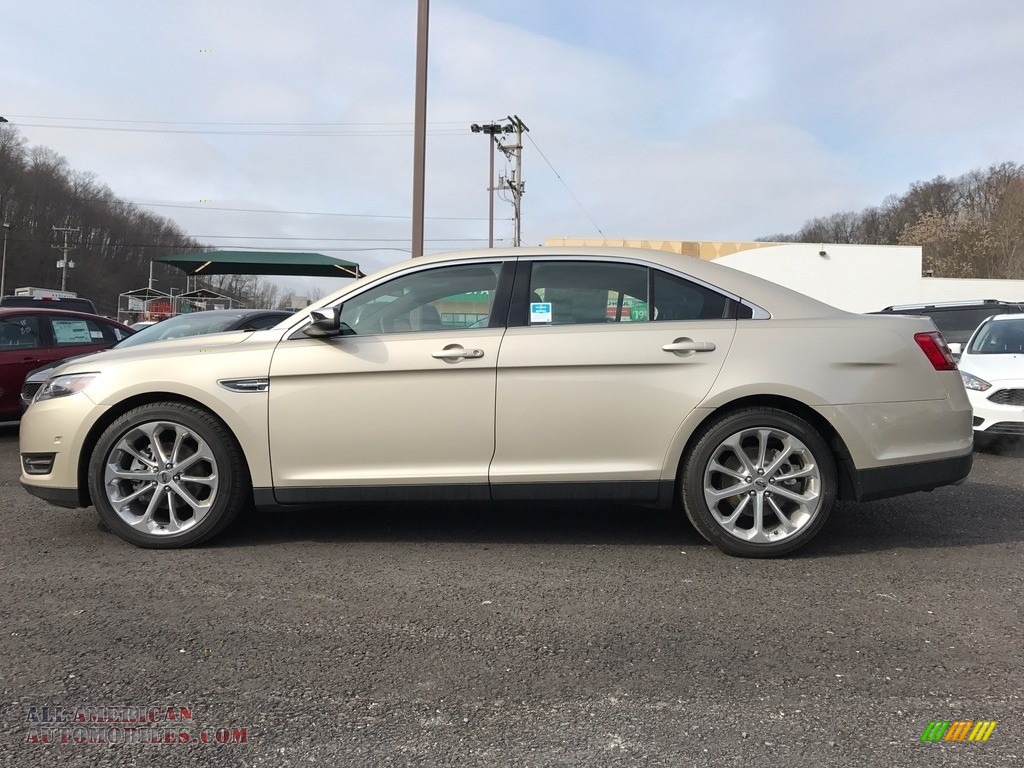 White Gold / Charcoal Black Ford Taurus Limited AWD