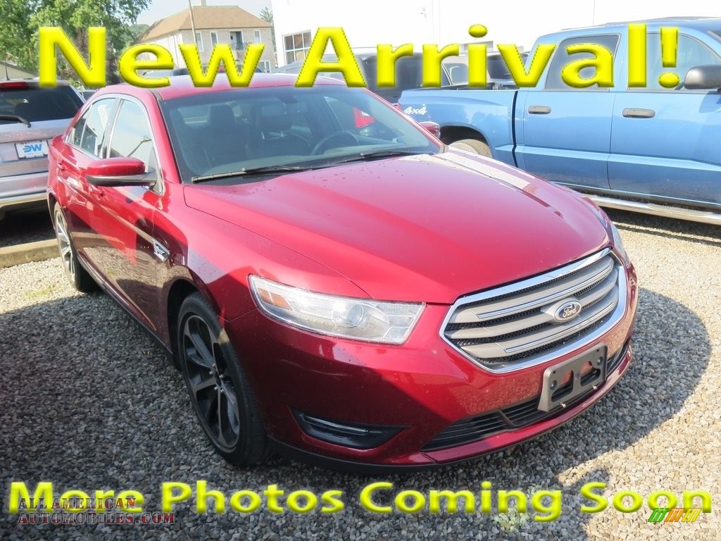 Ruby Red / Charcoal Black Ford Taurus SEL