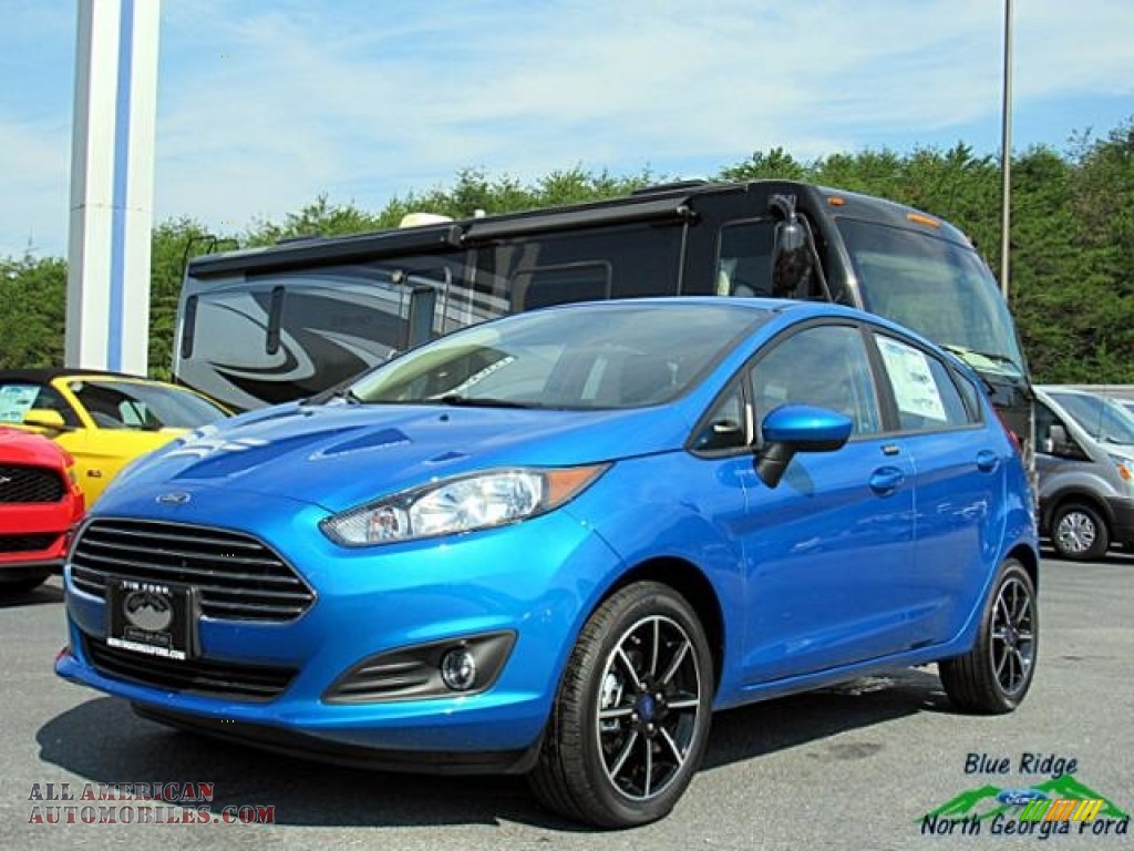 Blue Candy / Charcoal Black Ford Fiesta SE Hatchback
