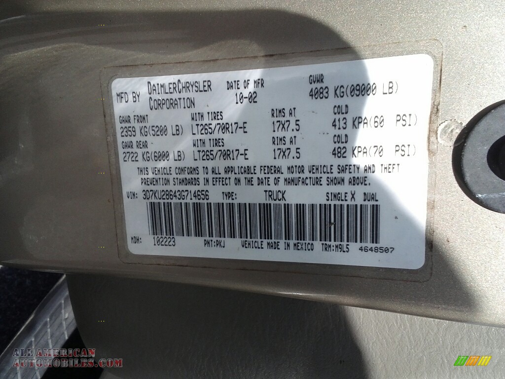 2003 Ram 2500 SLT Quad Cab 4x4 - Light Almond Pearl Metallic / Dark Slate Gray photo #26