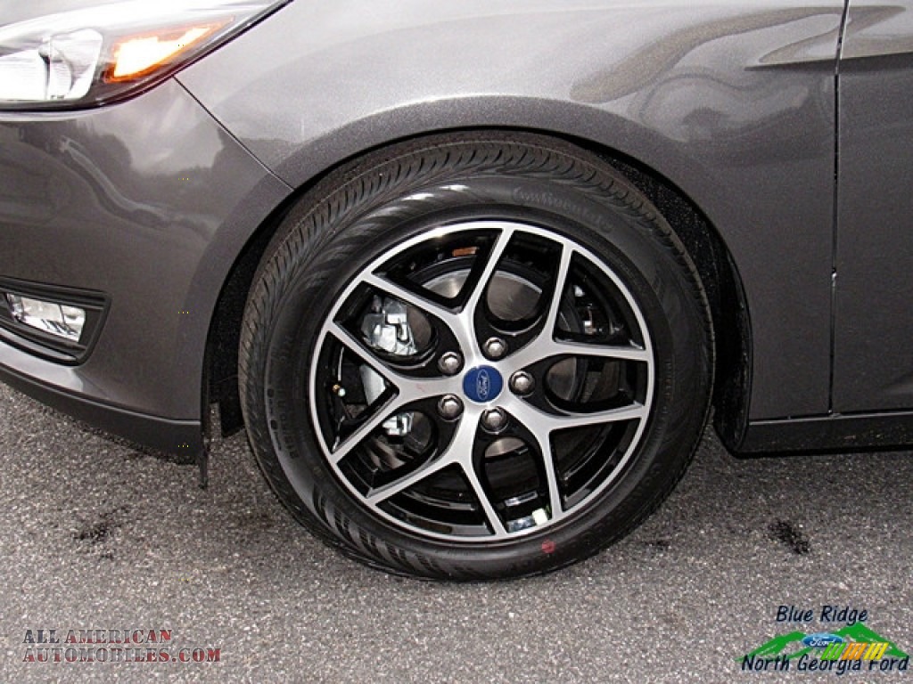 2018 Focus SE Sedan - Magnetic / Charcoal Black photo #9