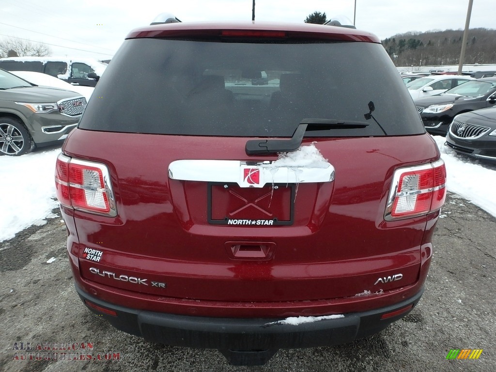 2009 Outlook XR AWD - Red Jewel Tintcoat / Black photo #10
