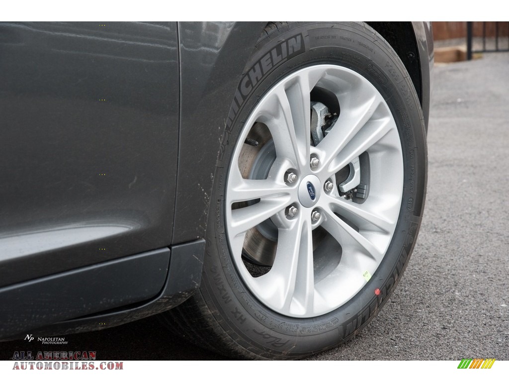 2018 Taurus SEL AWD - Magnetic / Charcoal Black photo #4