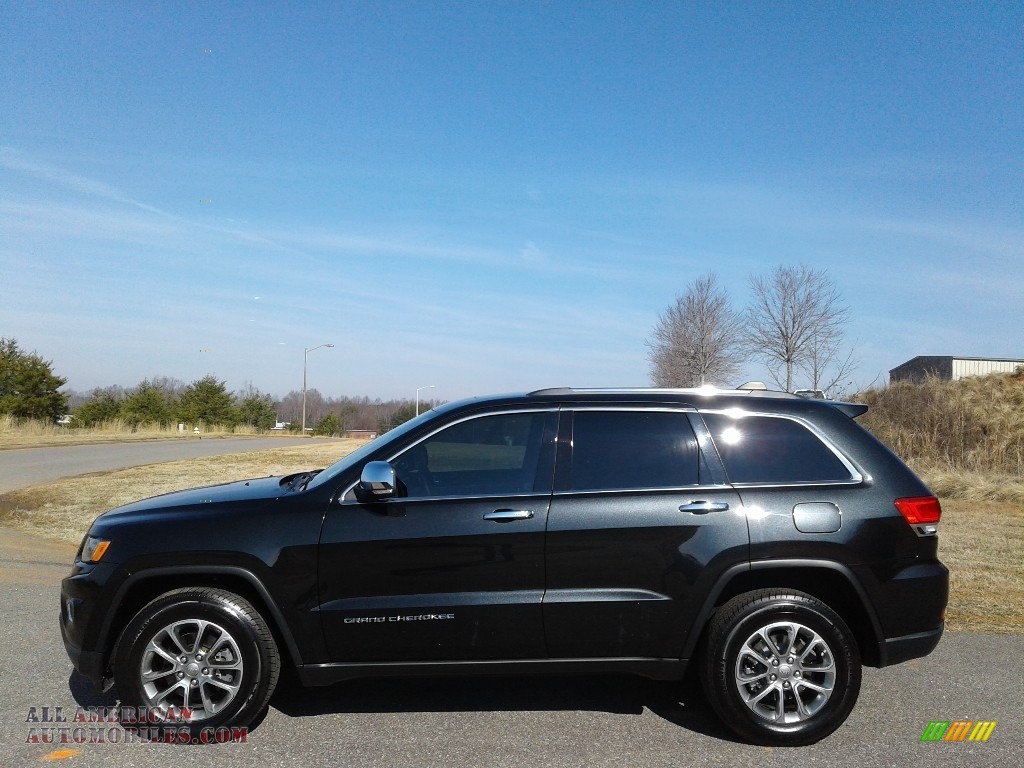 Brilliant Black Crystal Pearl / Black/Light Frost Beige Jeep Grand Cherokee Limited