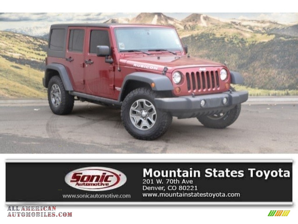 Deep Cherry Red Crystal Pearl / Black/Dark Saddle Jeep Wrangler Unlimited Rubicon 4x4