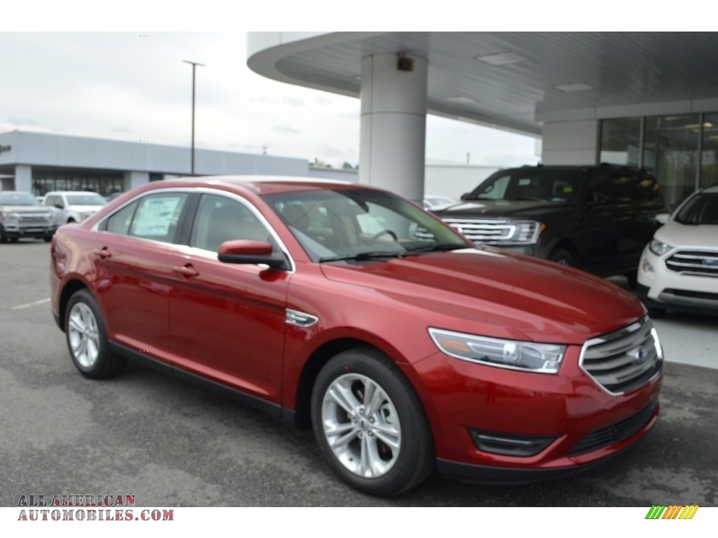 Ruby Red / Dune Ford Taurus SEL