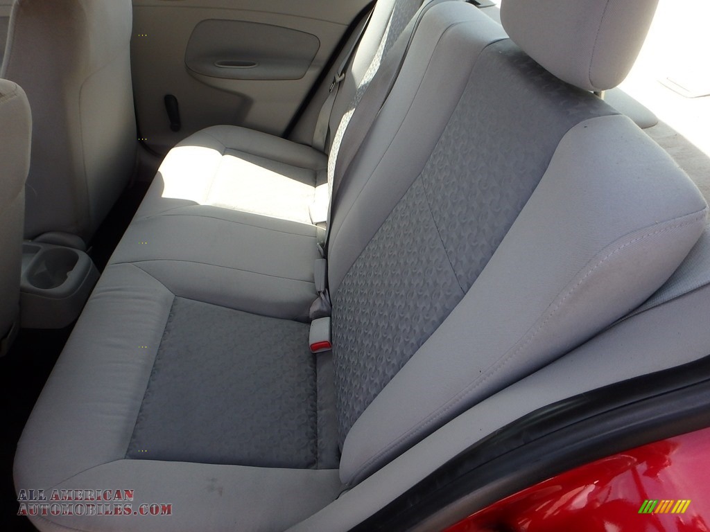 2010 Cobalt LS Sedan - Crystal Red Tintcoat Metallic / Gray photo #9