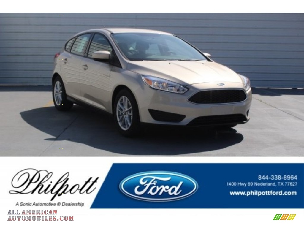 White Gold / Charcoal Black Ford Focus SE Hatch