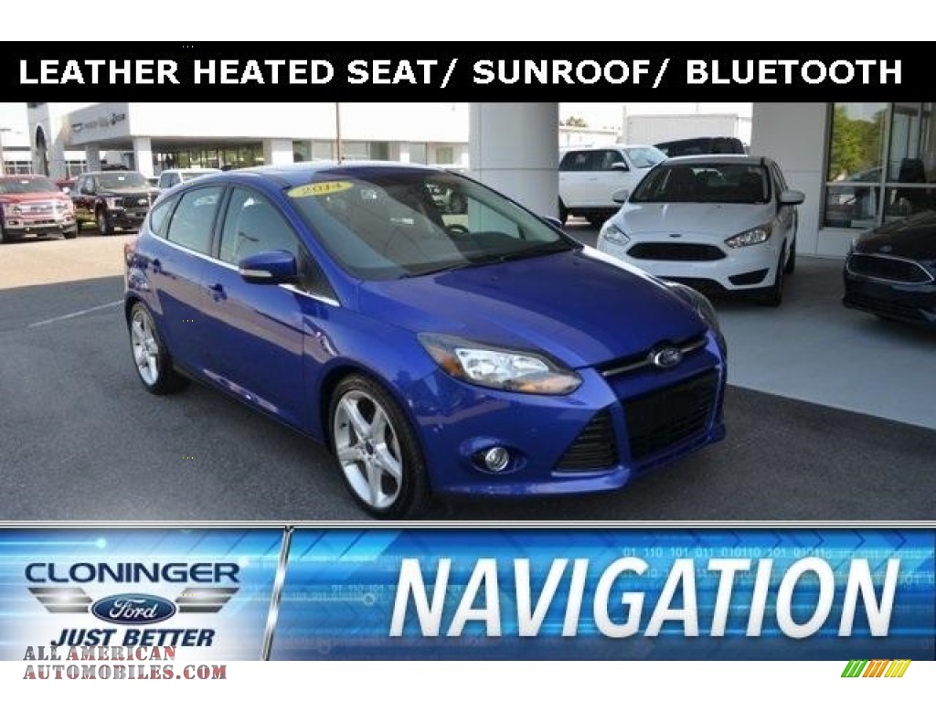 Blue Candy / Charcoal Black Ford Focus Titanium Hatchback