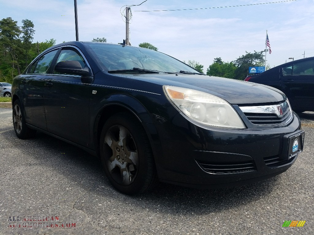 Carbon Flash Metallic / Tan Saturn Aura XE