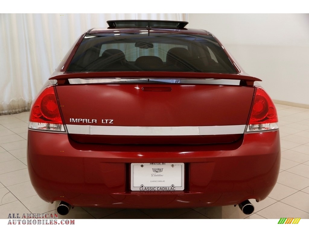 2009 Impala LTZ - Red Jewel Tintcoat / Ebony photo #22