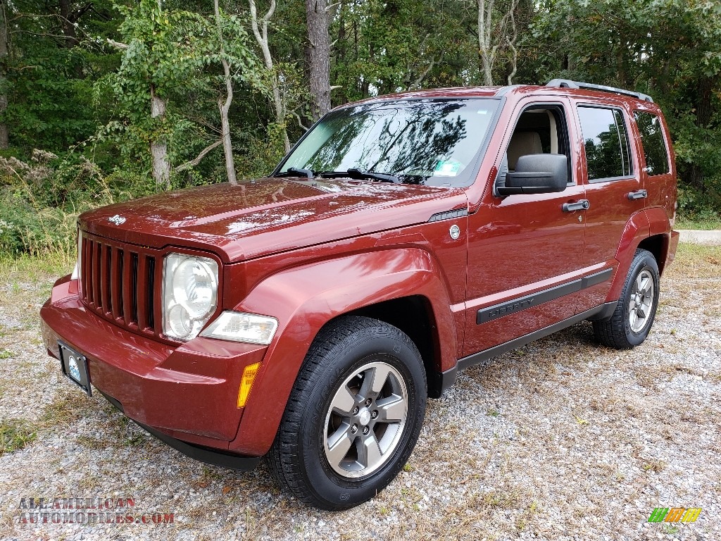 Inferno Red Crystal Pearl / Pastel Pebble Beige Jeep Liberty Sport 4x4