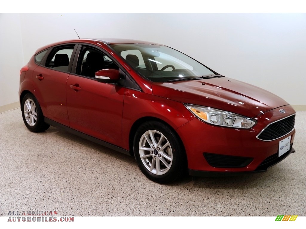 2016 Focus SE Hatch - Ruby Red / Charcoal Black photo #1