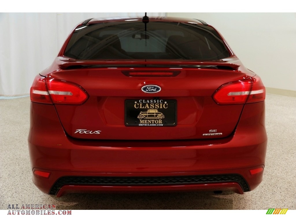 2015 Focus SE Sedan - Ruby Red Metallic / Charcoal Black photo #17