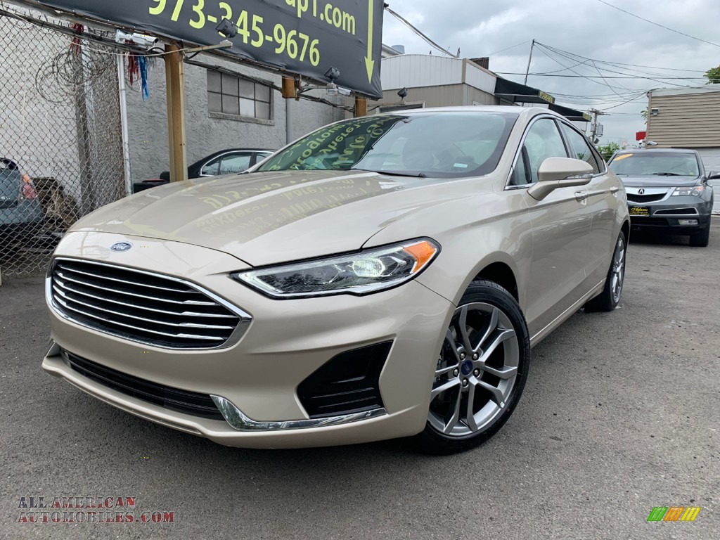 White Gold / Medium Light Stone Ford Fusion SEL