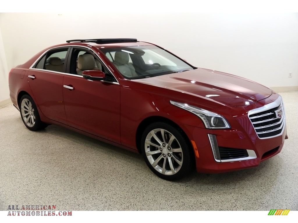 Red Obsession Tintcoat / Very Light Cashmere Cadillac CTS Luxury AWD