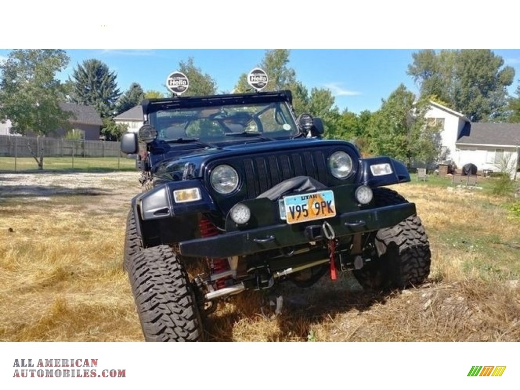 Black Clearcoat / Khaki Jeep Wrangler Sahara 4x4