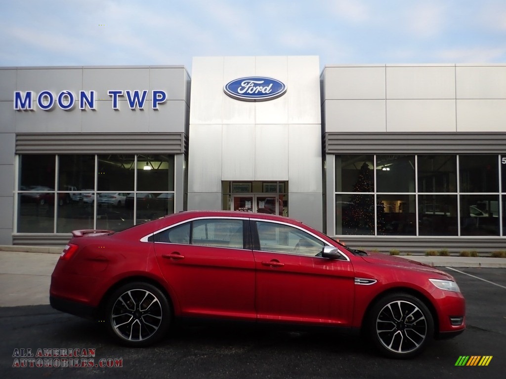 Ruby Red / Dune Ford Taurus Limited AWD
