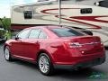 Ford Taurus Limited Ruby Red Metallic photo #3