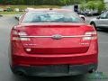 Ford Taurus Limited Ruby Red Metallic photo #4