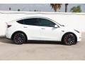 Tesla Model Y Performance AWD Pearl White Multi-Coat photo #12