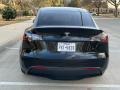 Tesla Model Y Long Range AWD Solid Black photo #4