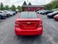 Chevrolet Sonic Premier Sedan Red Hot photo #4