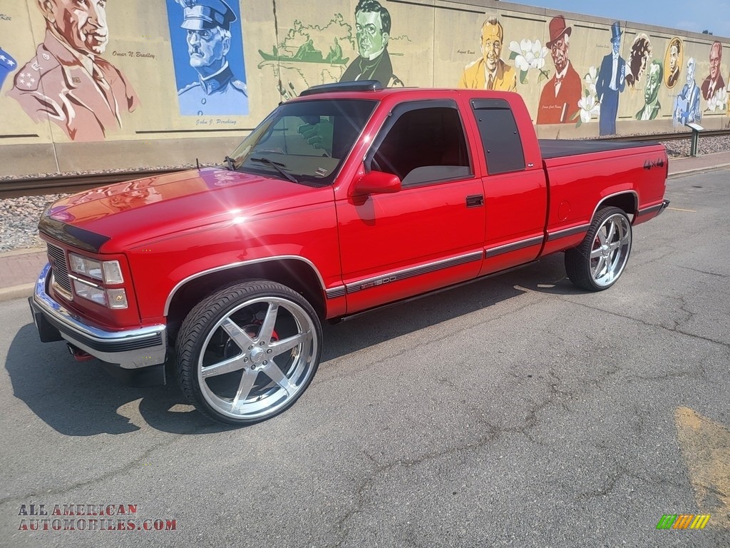 1999 Sierra 1500 SLE Extended Cab 4x4 - Fire Red / Beige photo #1