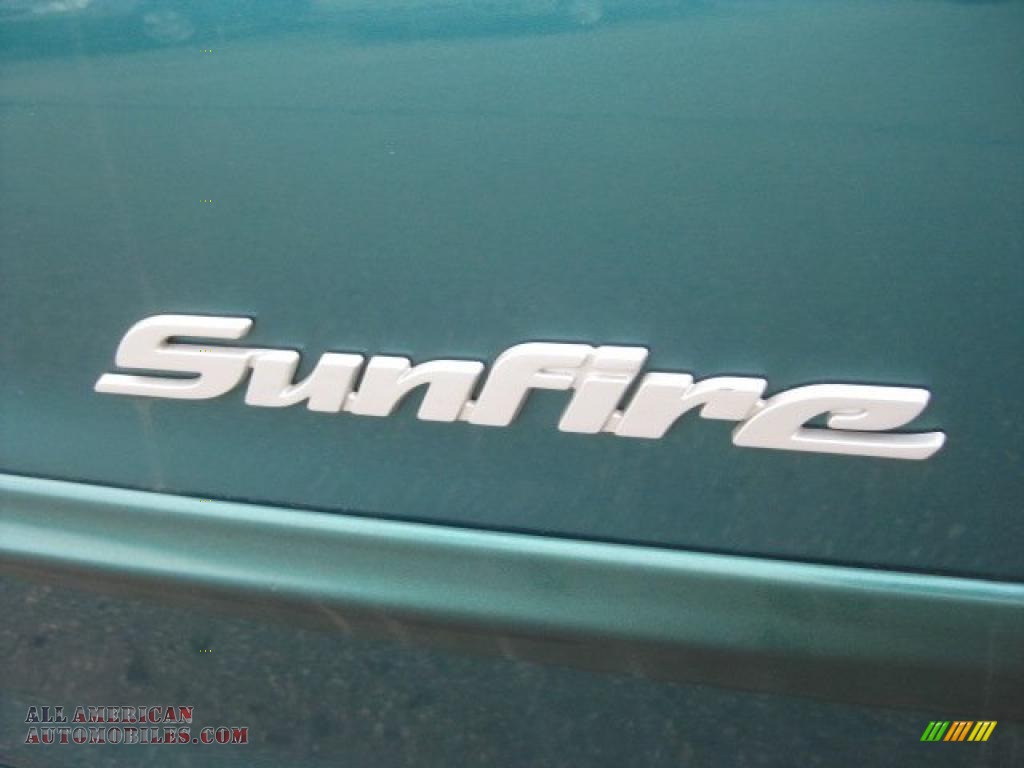 1999 Sunfire SE Sedan - Fern Green Metallic / Graphite photo #13