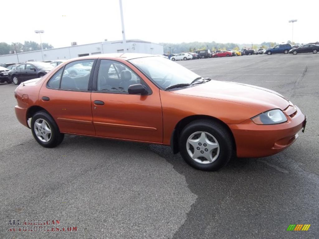 2005 Cavalier Sedan - Sunburst Orange Metallic / Graphite Gray photo #6